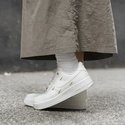 NIKE AIR FORCE 1 MINI SWOOSH | OFF WHITE