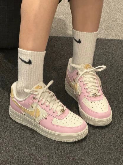 NIKE AIR FORCE 1 MINI SWOOSH | PINK GOLD